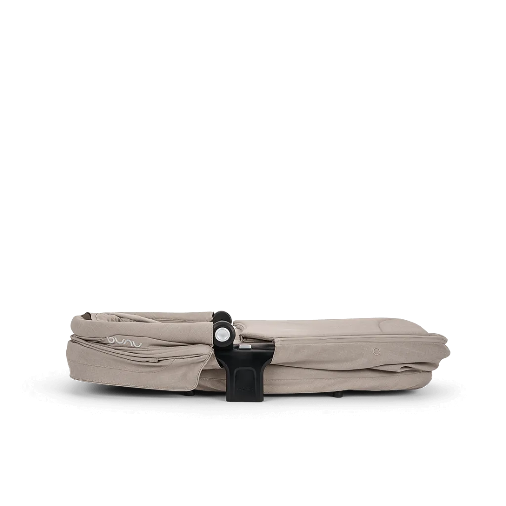 nuna_lytl_ixxa_chateau_folded_gl_web.webp
